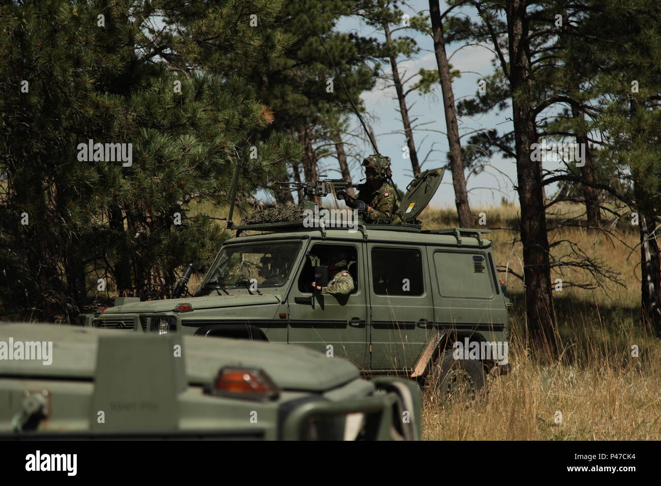 A Canadian G-Wagon from the King's Own Calgary Regiment, assumes a firing  position as a convoy is stopped at the counter improvised explosive device training  course on West Camp Rapid, as part