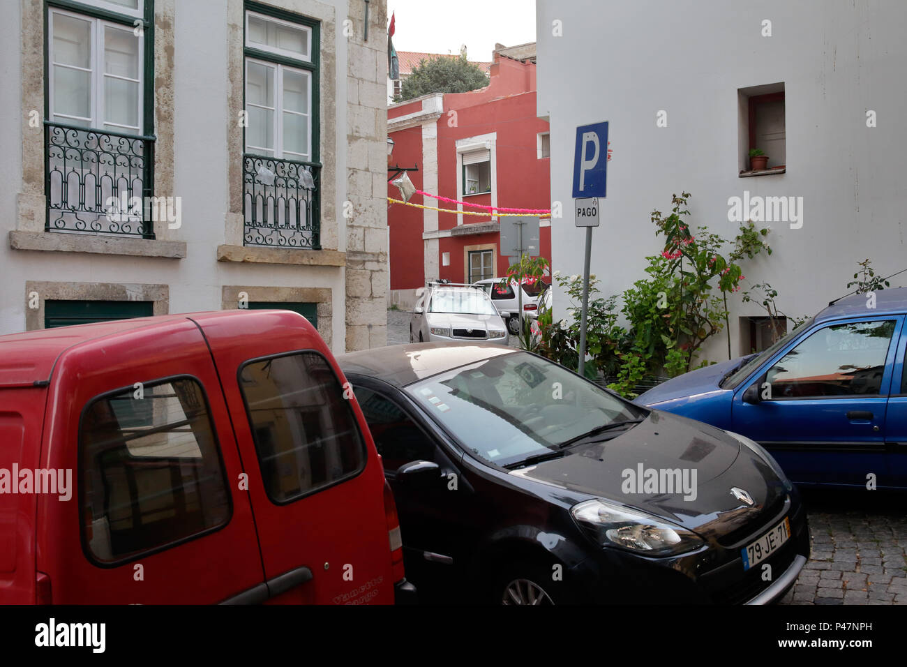 Lisbon, Portugal, cars park in the narrow streets in Alfama in Lisbon