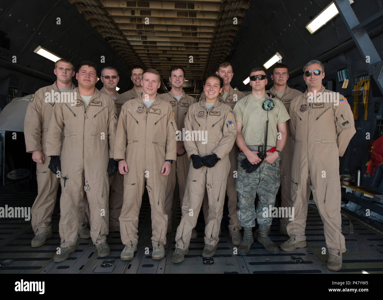 The C-5M Super Galaxy aircrew from the 9th Airlift Squadron who completed a  circumnavigation mission pose for a photo inside a C-5 June 2, 2016, at  Davis-Monthan Air Force Base, Ariz. The