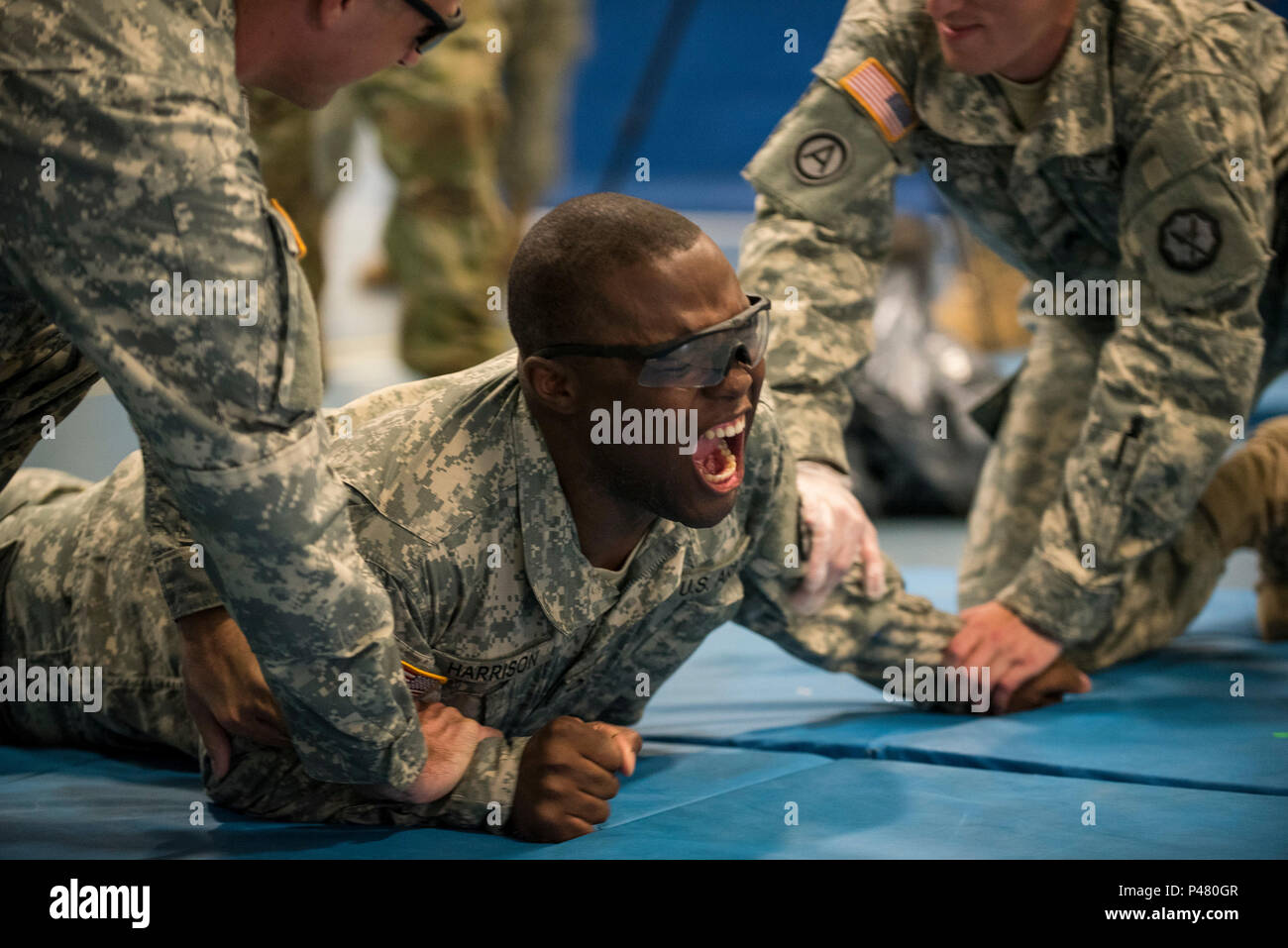U.S. Army Reserve Pfc. Chauncey Harrison receives a 5second pulse shot