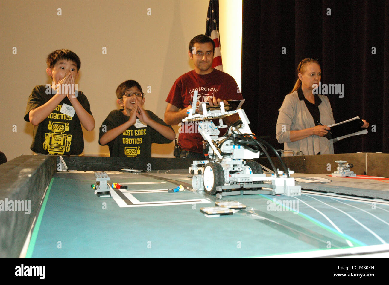 Students from Forest Edge Elementary in Reston, Virginia, test their robot for Naval Surface Warfare Center, Carderock Division during the 2016 Carderock LEGO Robotics Competition in West Bethesda, Maryland, on June 10, 2016. The competition challenges students to design, build, and program robots to perform tasks, promoting STEM education, problem-solving, teamwork, and engineering skills in partnership with U.S. Navy personnel and engineers. Stock Photo