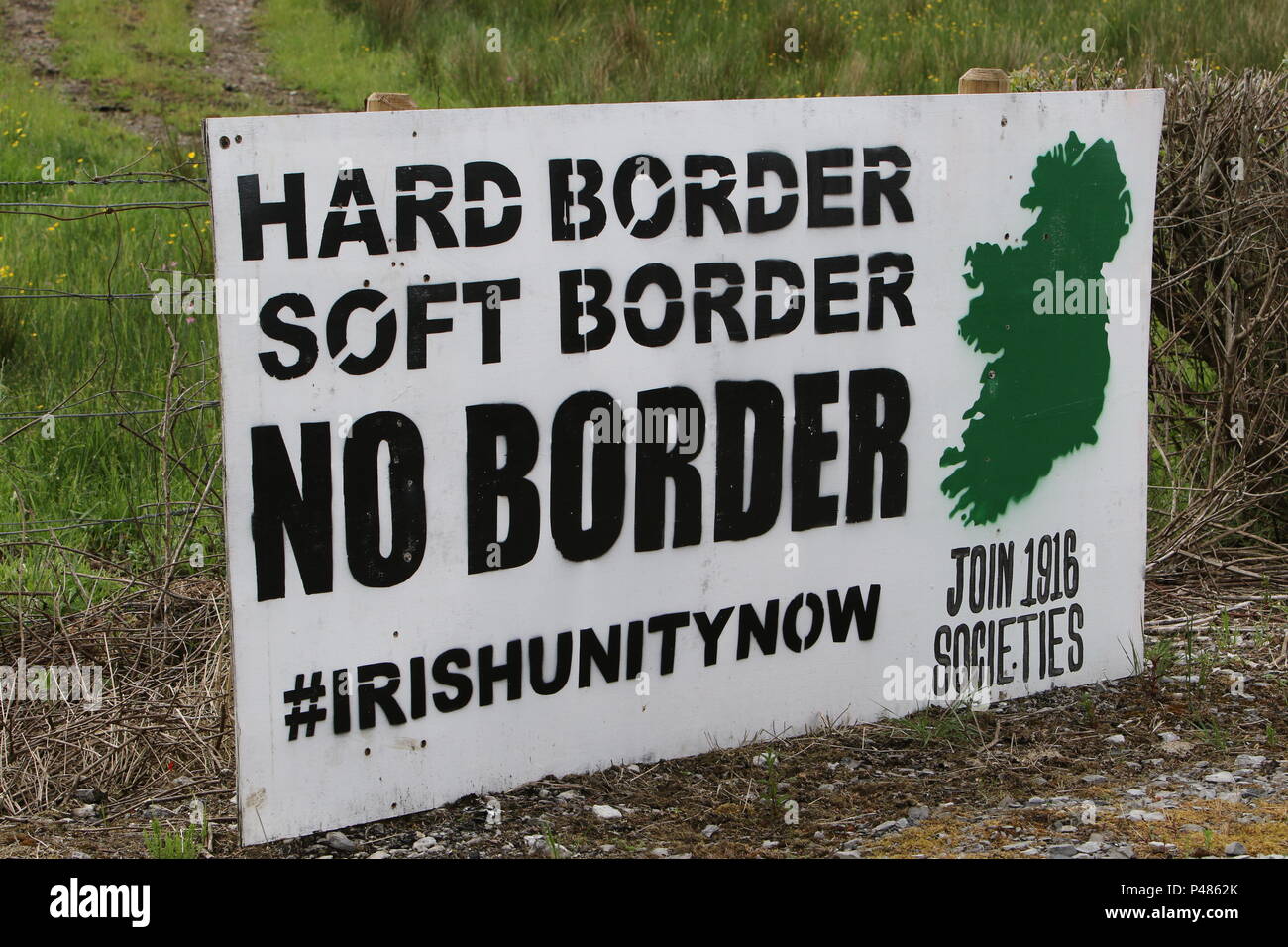 Ireland, UK, 2 June 2018. Irish Unity Hard Soft No Border sign at edge of road near Irish border and important to ongoing Brexit negotiations. Stock Photo