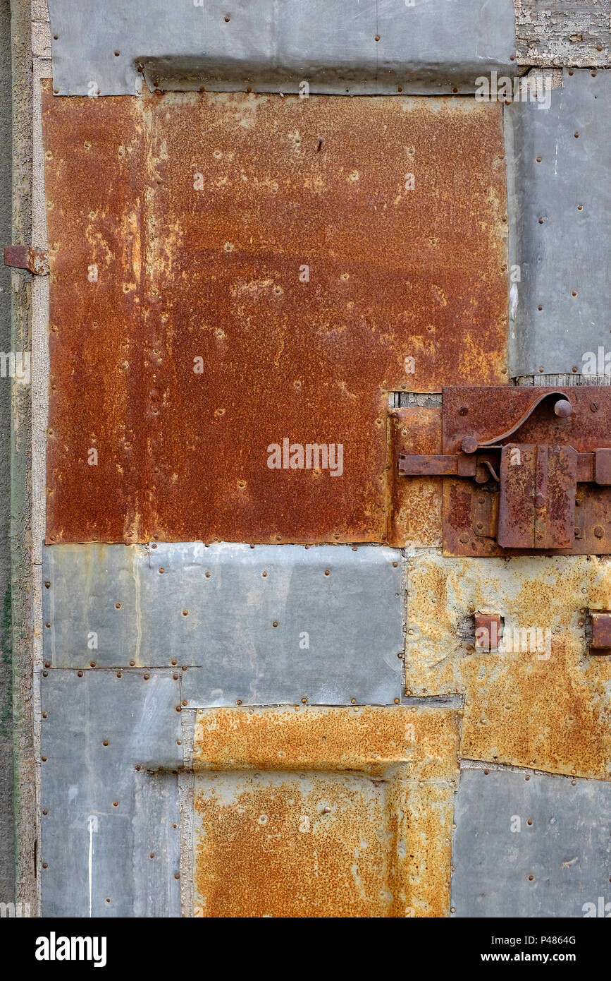 rusty metal door, tuscany, italy Stock Photo