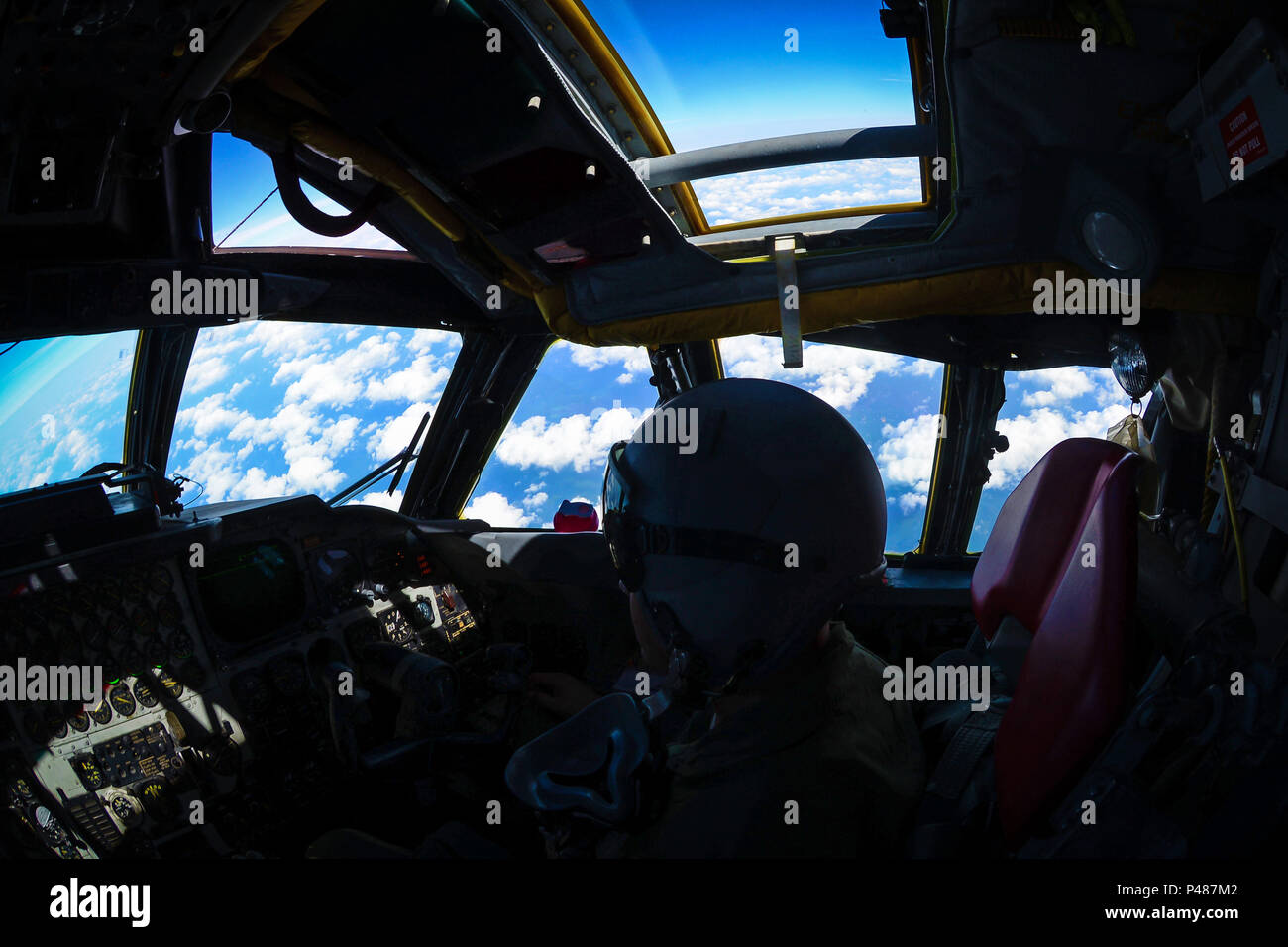 Lt. Col. Wade Karren, 11th Bomb Squadron commander, copilots a B-52 Stratofortress during a simulated bomb drop June 15, 2016. The bomb drop was part of a B-52 and B-1 Lancer integration flight fostering teamwork between bomber pilots of different aircraft. (U.S. Air Force photo/Senior Airman Luke Hill) Stock Photo