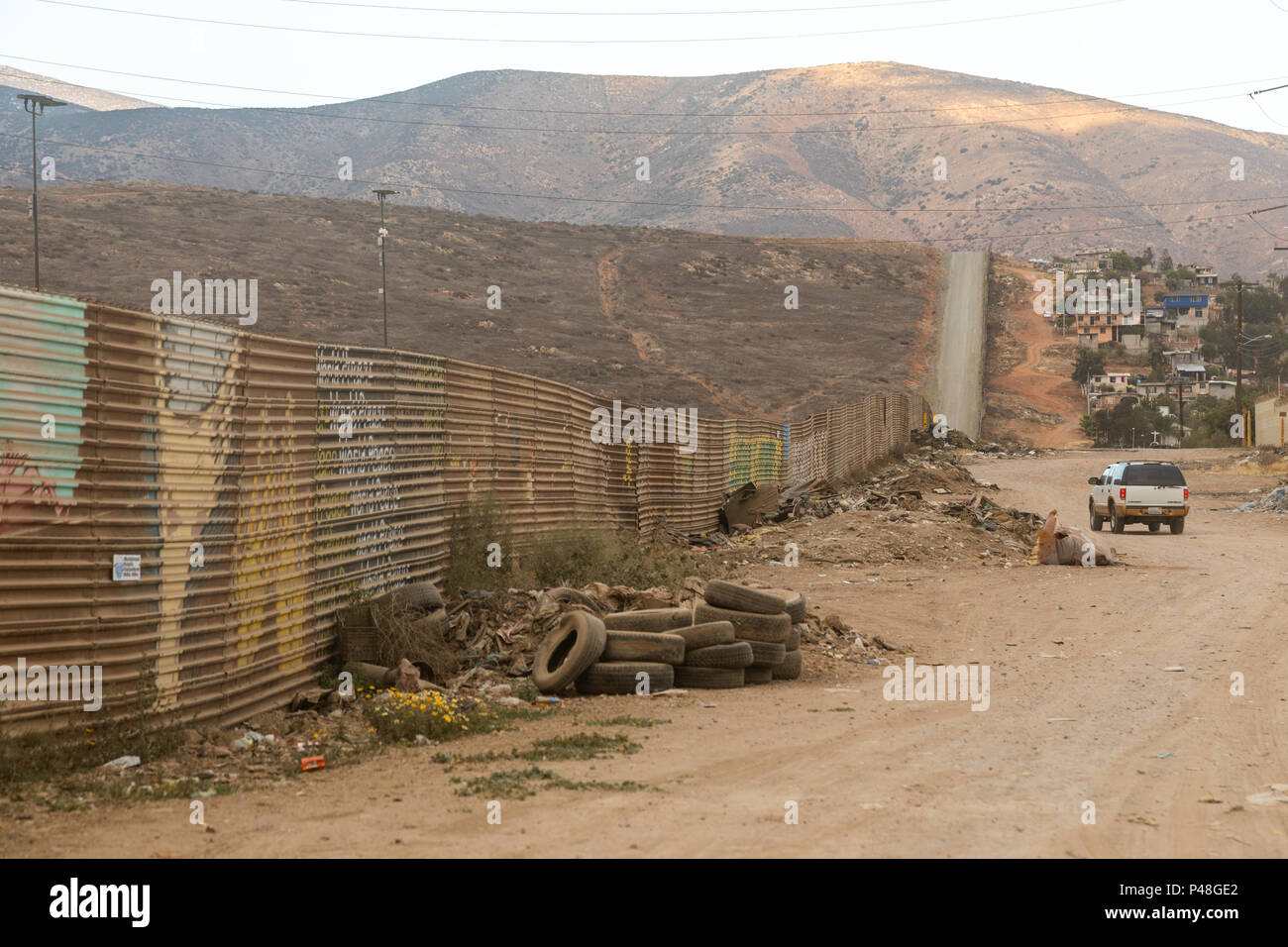 Original US Mexico border fence with prototypes of the proposed new Trump wall erected just