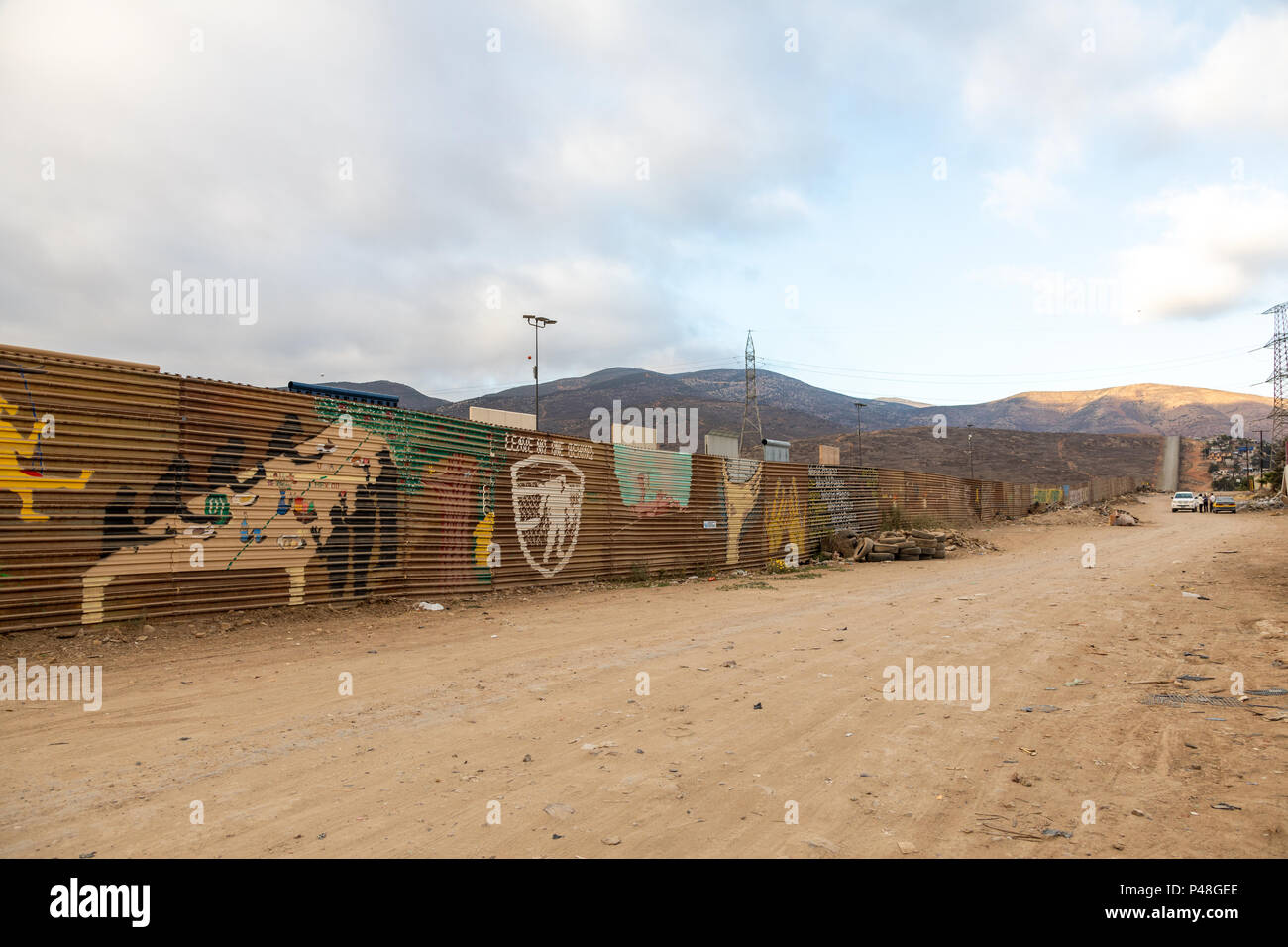 Original US Mexico border fence with prototypes of the proposed new Trump wall erected just
