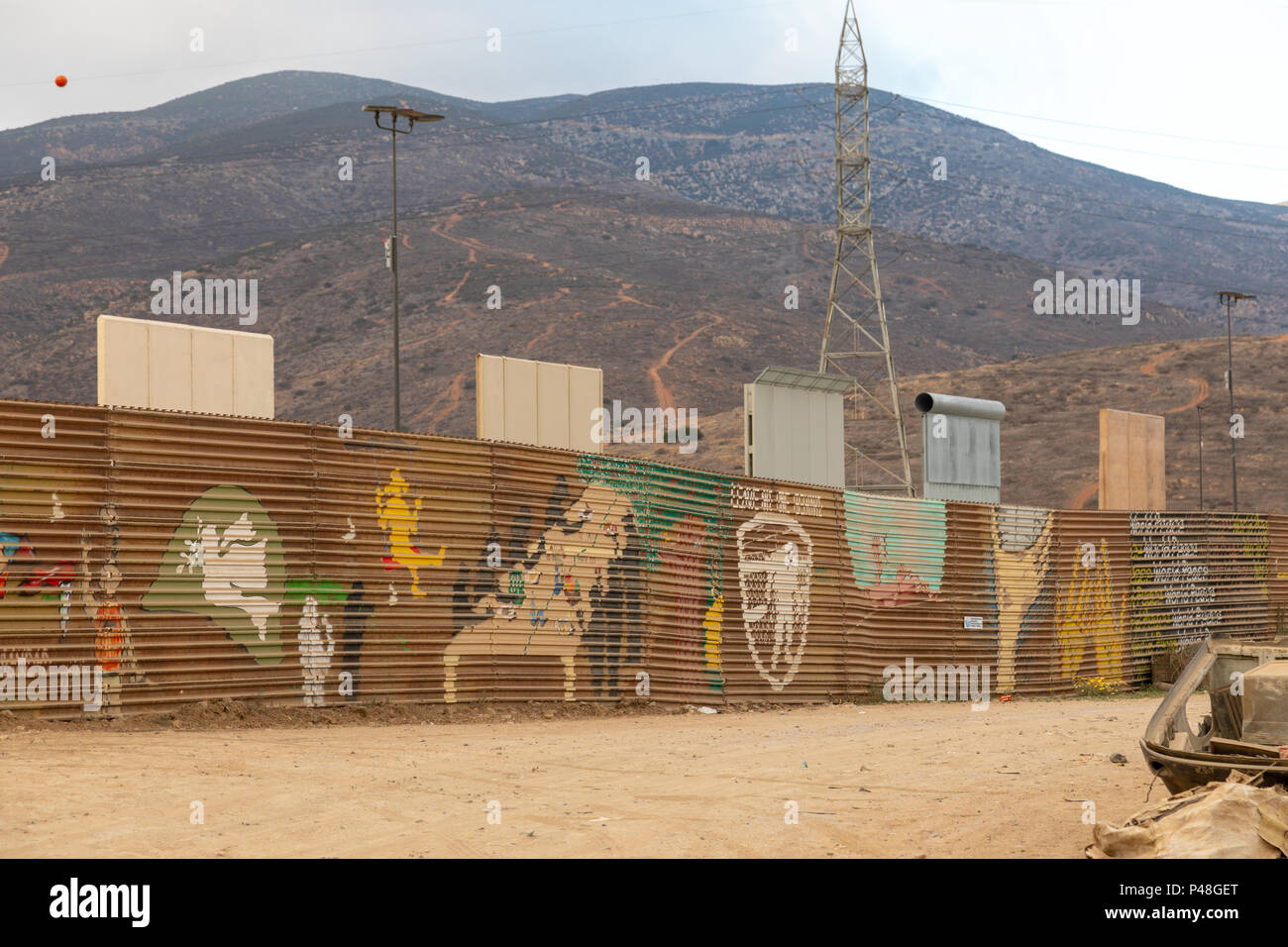 Original US Mexico border fence with prototypes of the proposed new Trump wall erected just