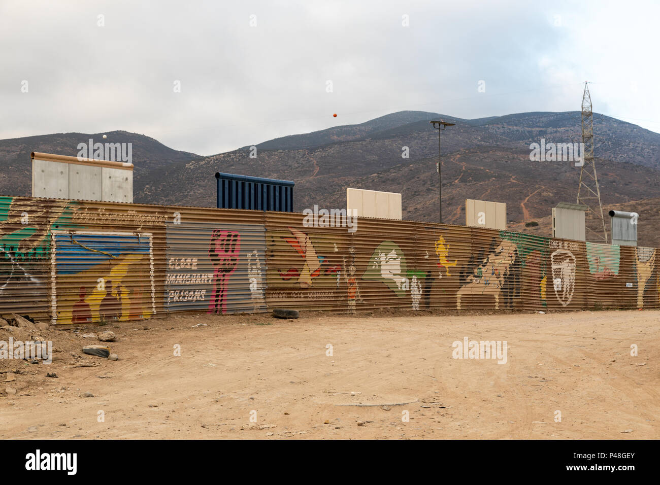 Original US Mexico border fence with prototypes of the proposed new Trump wall erected just