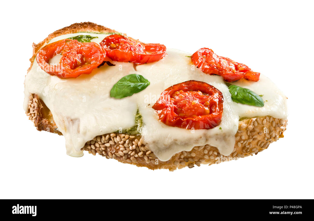 Open Faced Tomato Basil and Mozzarella sandwich Stock Photo