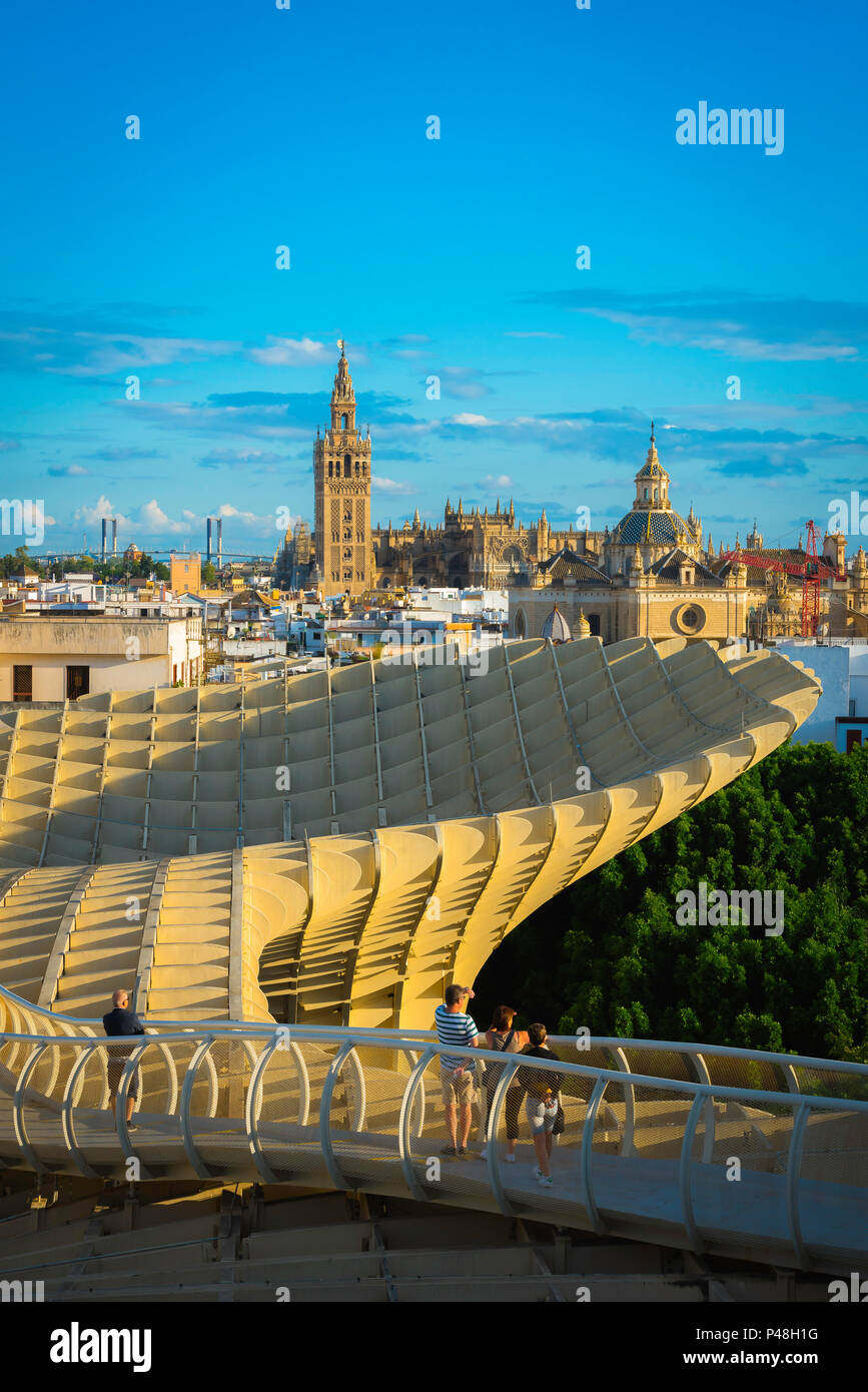 Seville Metropol Parasol, view at sunset from the Las Setas (the Metropol Parasol) walkway towards the old city skyline of Seville, Andalucia, Spain. Stock Photo