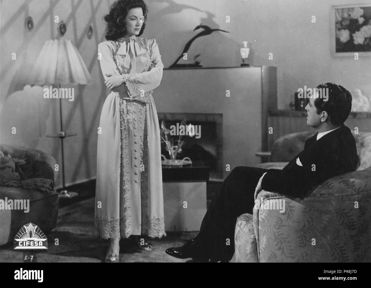 Original Film Title: LA DEVORADORA.  English Title: LA DEVORADORA.  Film Director: FERNANDO DE FUENTES.  Year: 1946.  Stars: MARIA FELIX; LUIS ALDAS. Credit: PRODUCCIONES GROVAS / Album Stock Photo