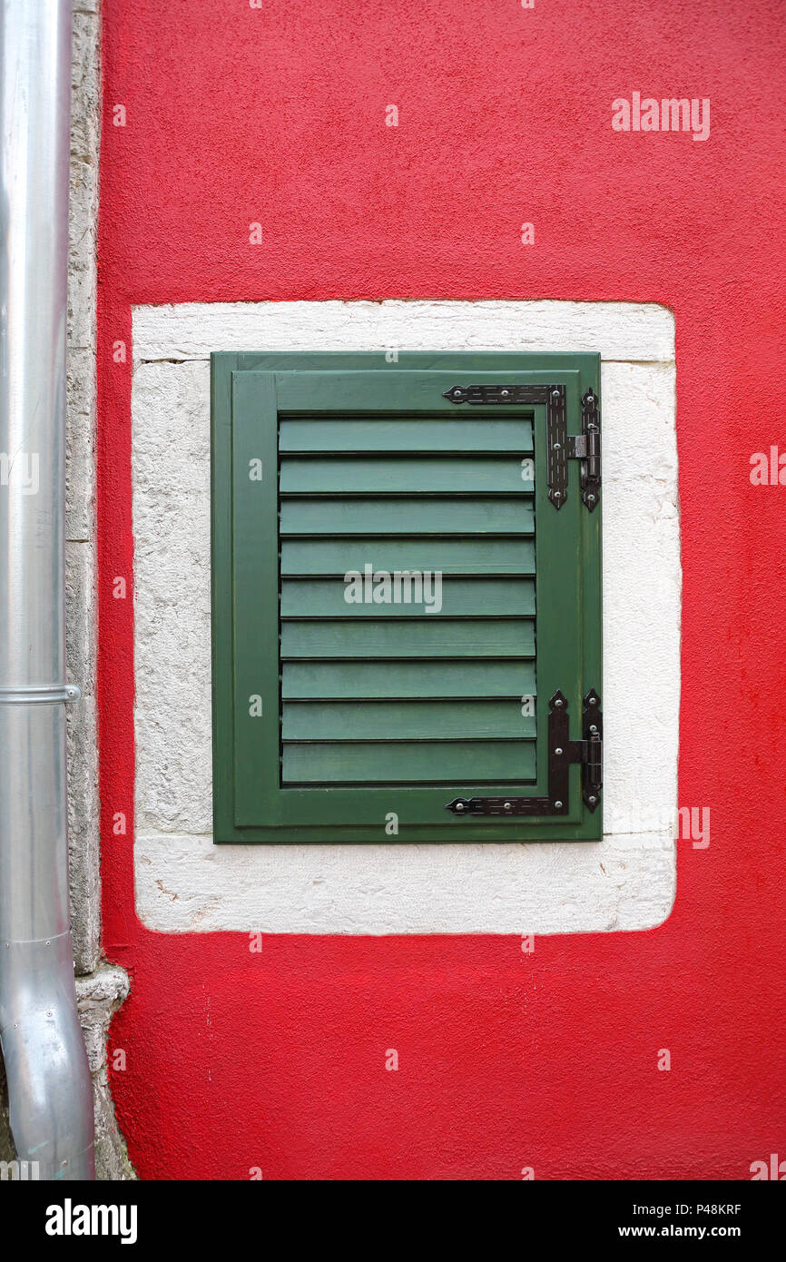 Closed Green Window Shutters at Red House Stock Photo - Alamy