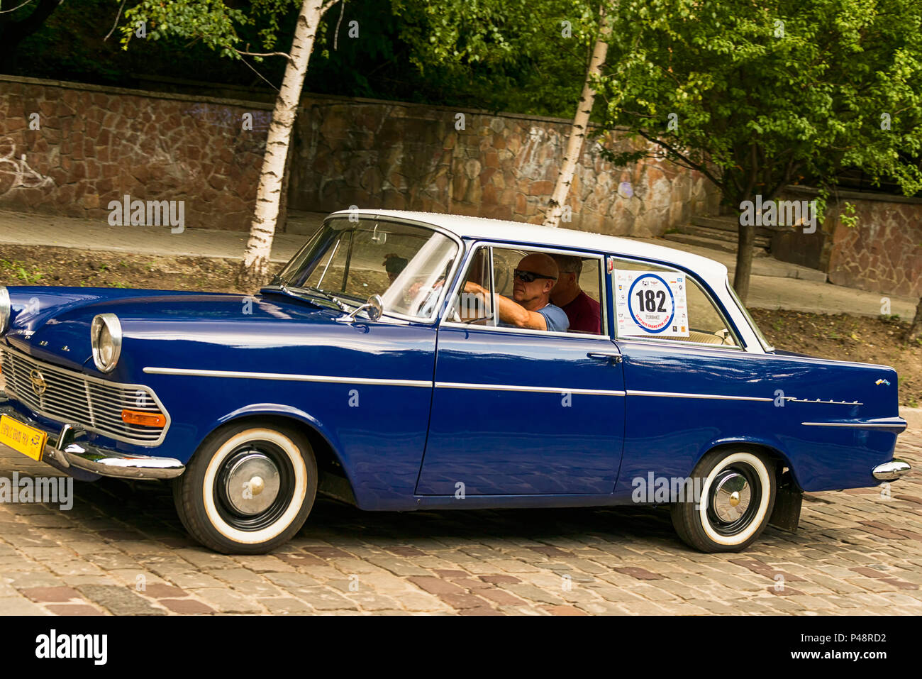 Lviv, Ukraine - June 3, 2018:Old retro car Opel RFN with its owner and an unknown passenger taking participation in race Leopolis grand prix 2018, Ukr Stock Photo