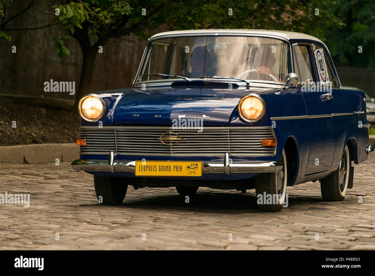 Lviv, Ukraine - June 3, 2018:Old retro car Opel RFN with its owner and an unknown passenger taking participation in race Leopolis grand prix 2018, Ukr Stock Photo