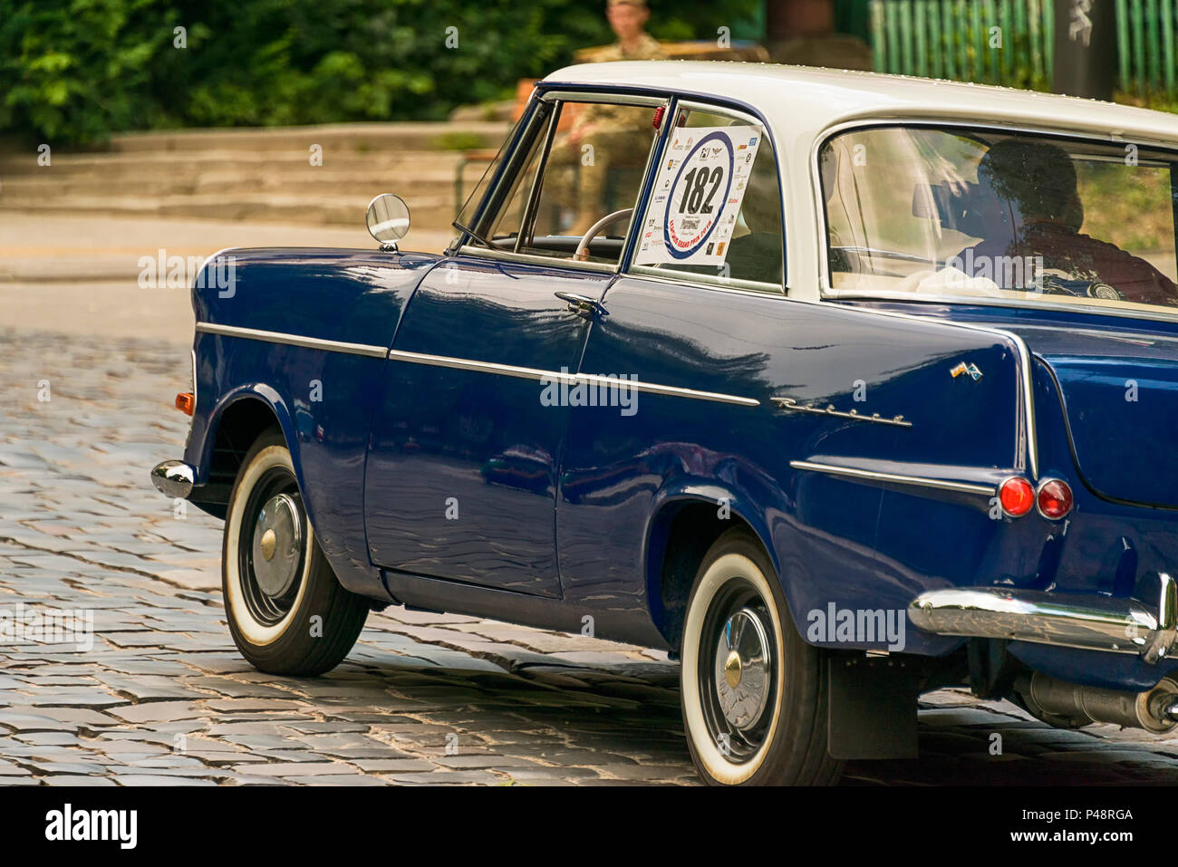 Lviv, Ukraine - June 3, 2018:Old retro car Opel RFN with its owner and an unknown passenger taking participation in race Leopolis grand prix 2018, Ukr Stock Photo