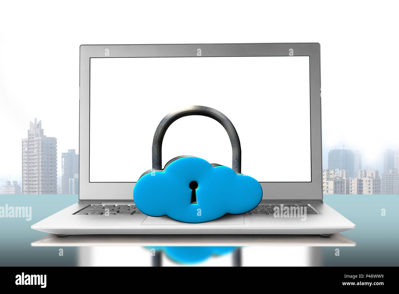 Cloud shape lock on laptop with city view background Stock Photo
