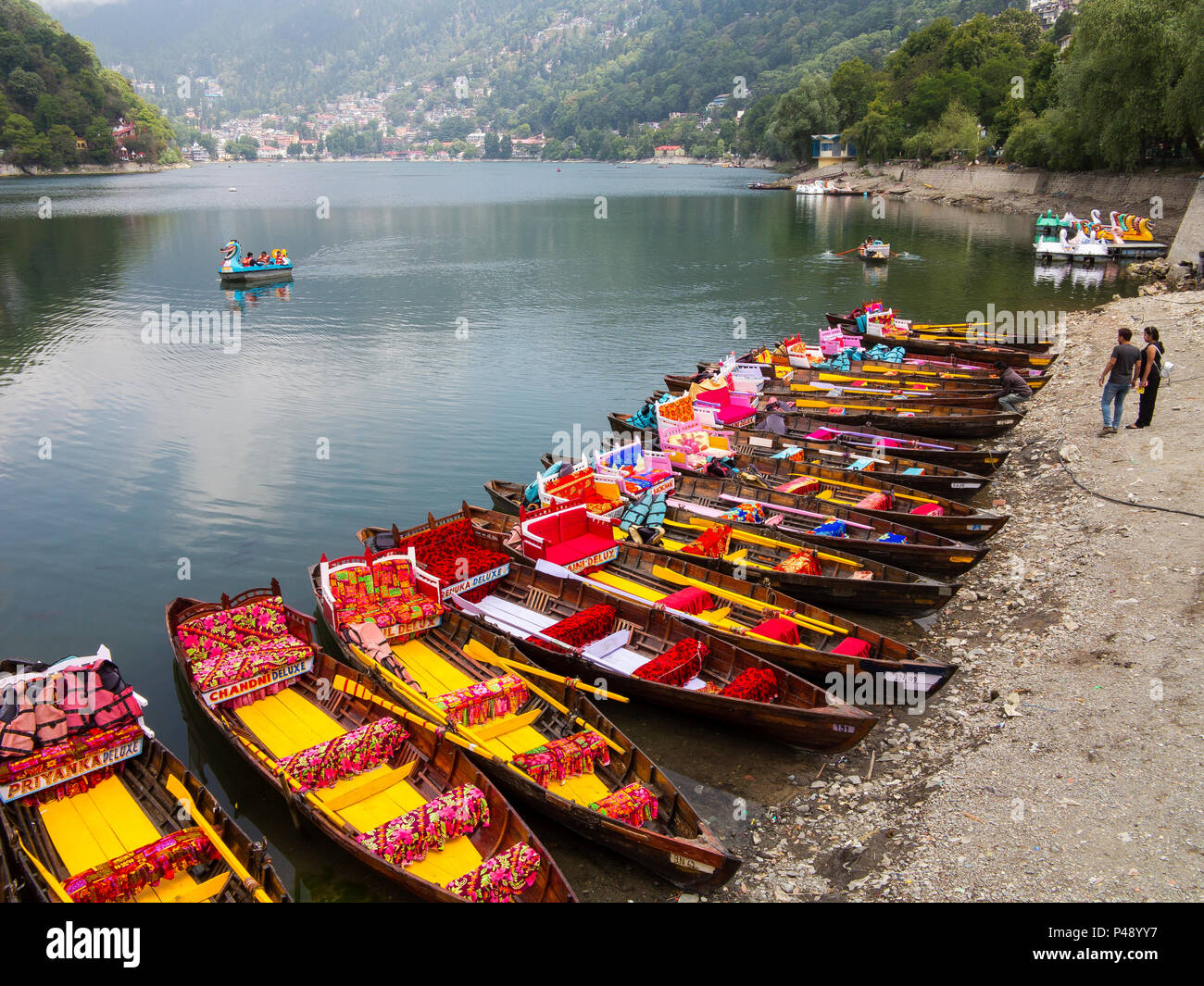 Colorful tourist boats at Nainital Lake, Nainital, Uttarakhand, India Stock Photo
