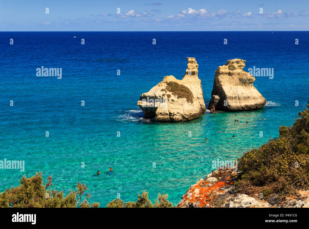 The most beautiful coast of Apulia: Torre Dell'Orso Bay, ITALY  (Lecce).Typical seascape of Salento: view of the two stacks called The Two  Sisters Stock Photo - Alamy