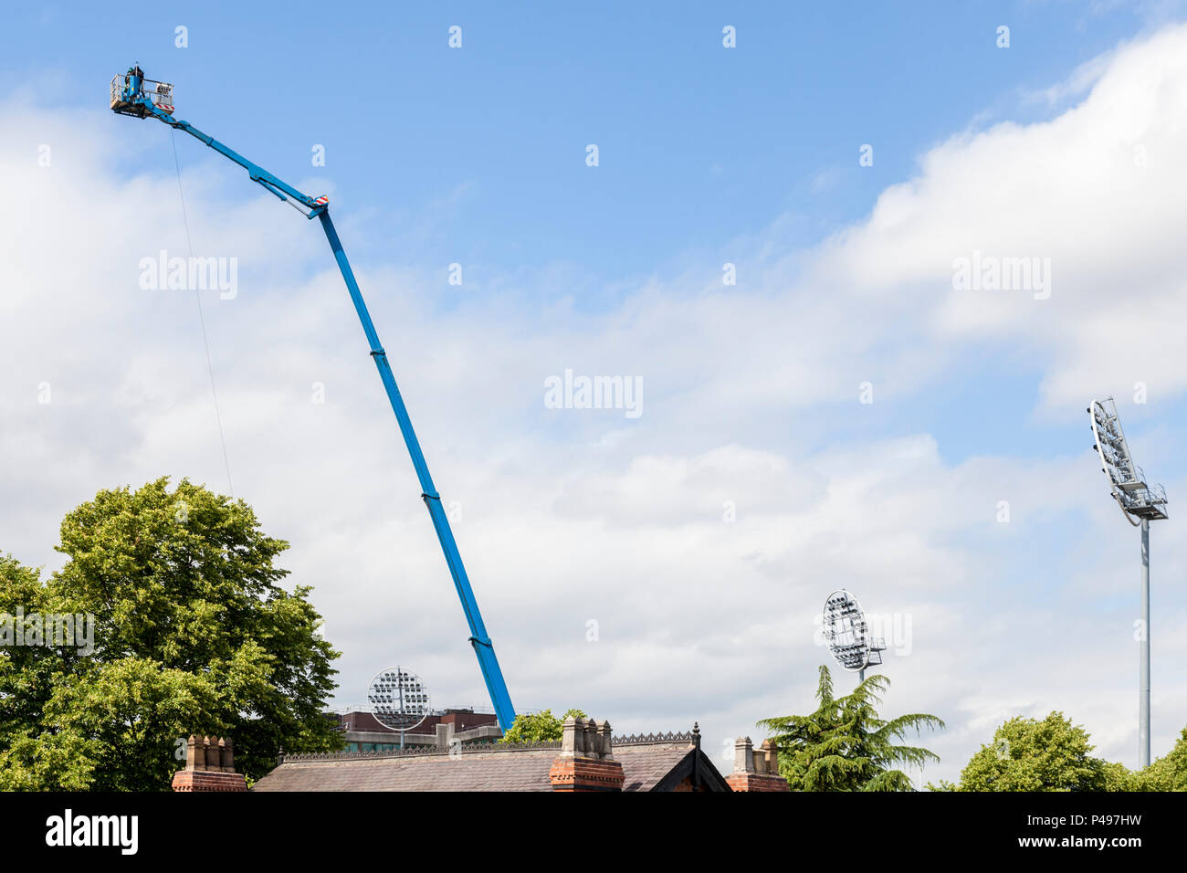 TV camera operator on an elevated platform at an outside broadcast, Trent Bridge Cricket Ground, Nottinghamshire, England, UK Stock Photo