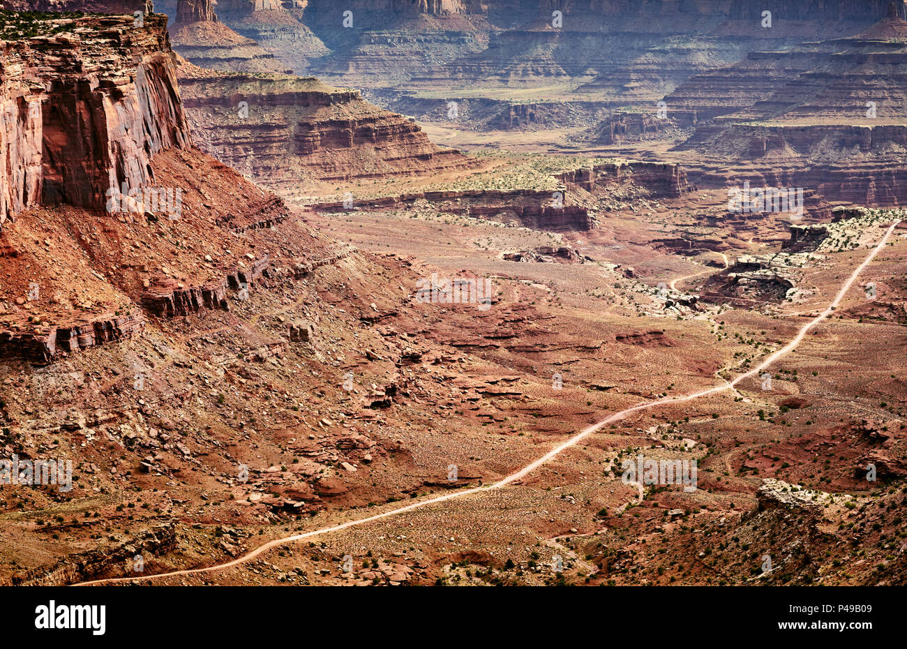 Aerial view of a dirt road in Canyonlands National Park, Island in the Sky region, Utah, USA. Stock Photo