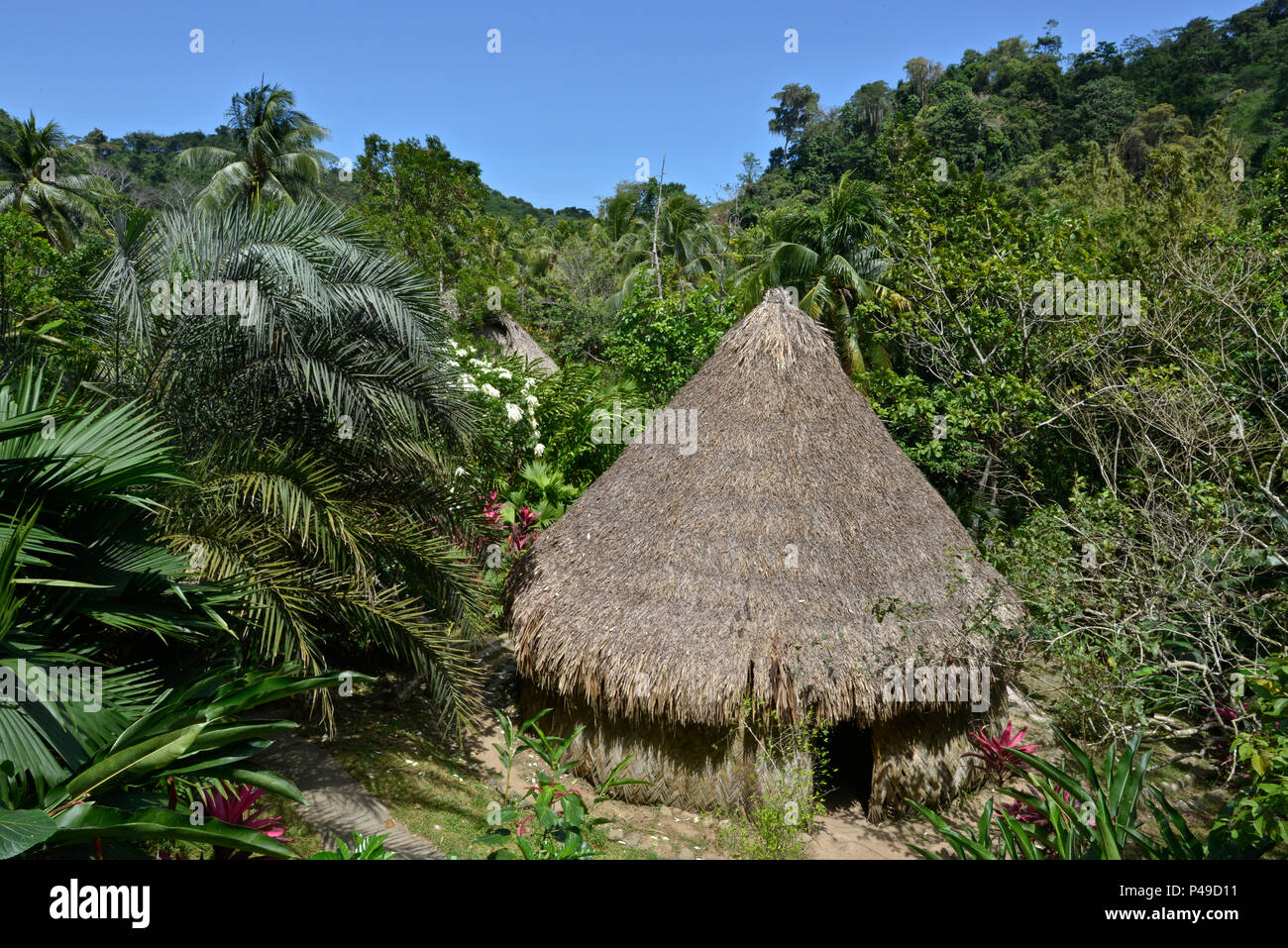 Kogui Huts are build in a series of villages containing circular huts made of stone, mud, and palm leaves.The Sierra Nevada de Santa Marta is home to  Stock Photo