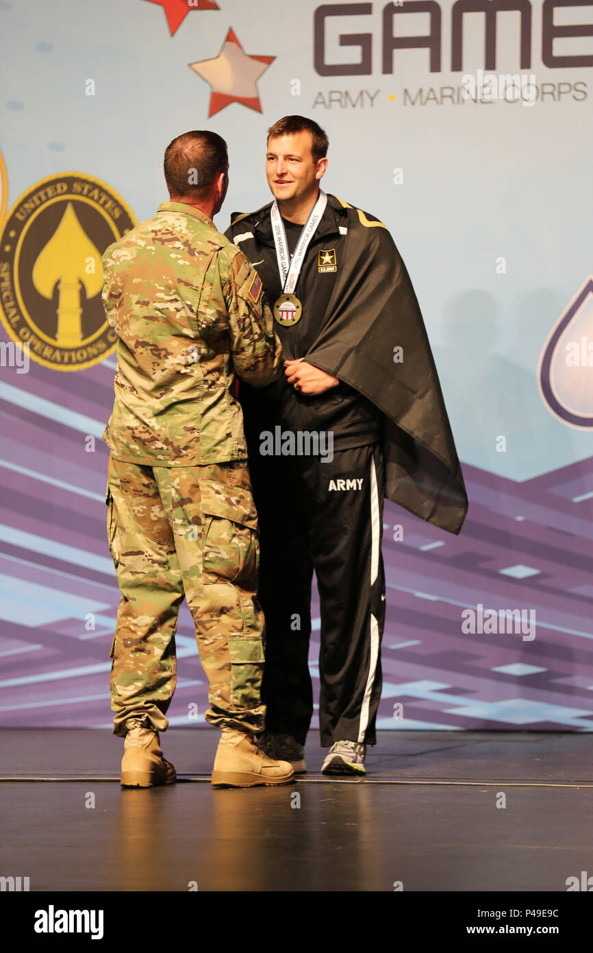 U.S. Army Veteran, Capt. Ryan Brunett, of Troy, Montana, is awarded a ...