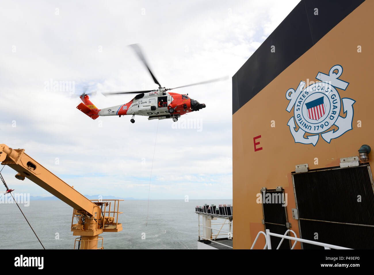 A Coast Guard aircrew aboard an MH60 Jayhawk helicopter from Air