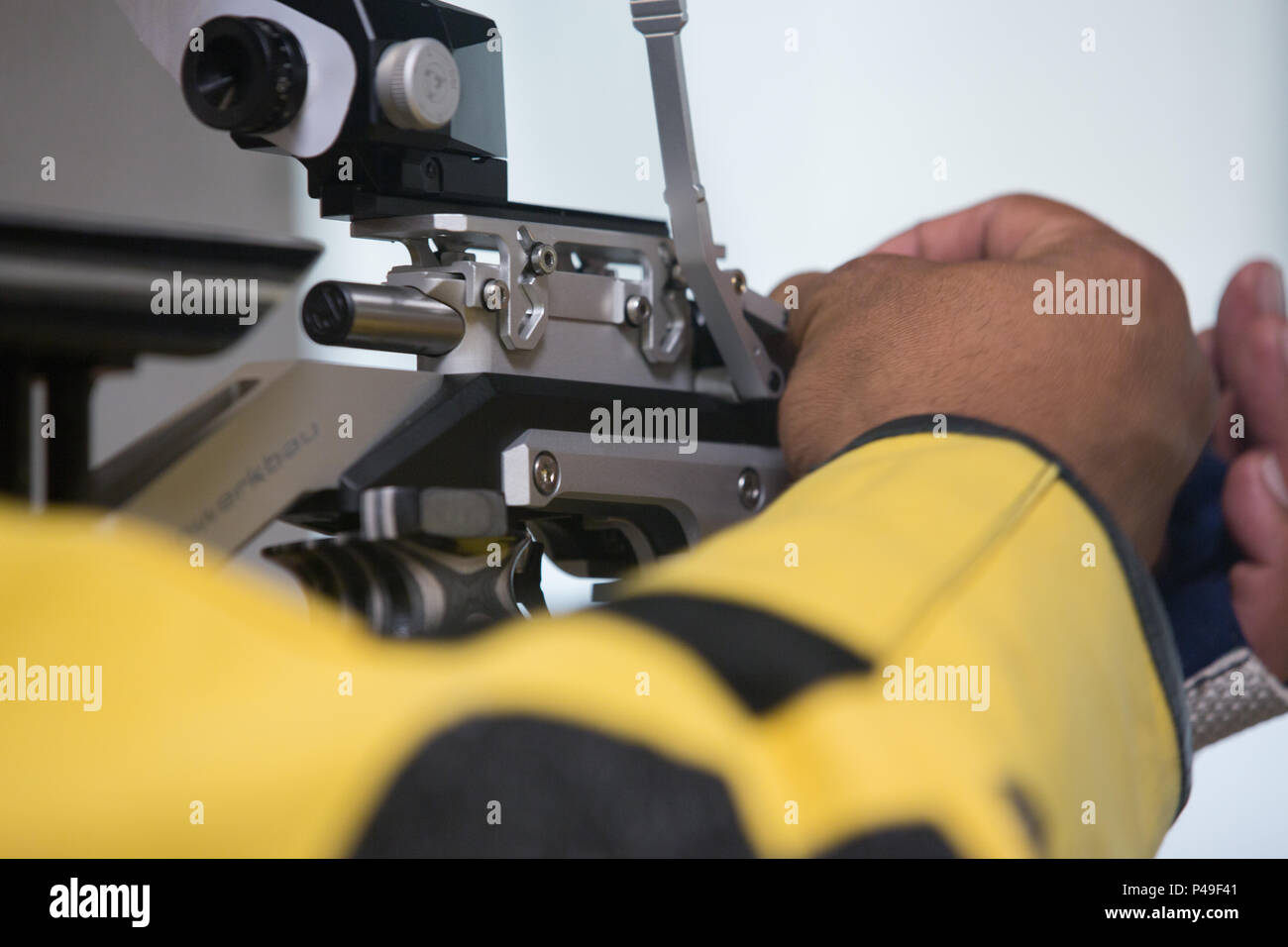 U.S. Army Veteran, Class David Iuli, of Fullerton, California, loads a  pellet in his Walther LG400 Alutec Competition air rifle during the 2016  Department of Defense Warrior Games, in Tronsrue Marksmanship Center