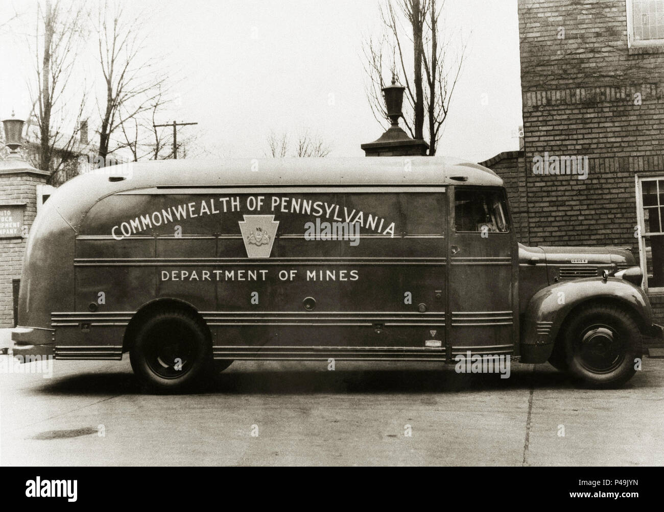 The Commonwealth of Pennsylvania USA Mine Rescue Truck of 1947,equipped with the necessary breathing apparatus, gas masks, first-aid supplies, analytical apparatus and such other chemical and scientific instruments commonly used and necessary in the work of first aid and mine rescue. 'Pennsylvania Anthracite Coal Mine Act.' Pennsylvania was the largest producer of Anthracite coal during the Industrial revolution in the United States. Particularly  around the Wilkes Barre and Scranton areas, Luzerne and Lackawanna counties of North Eastern Pennsylvania. Mine rescue was always in demand. Stock Photo