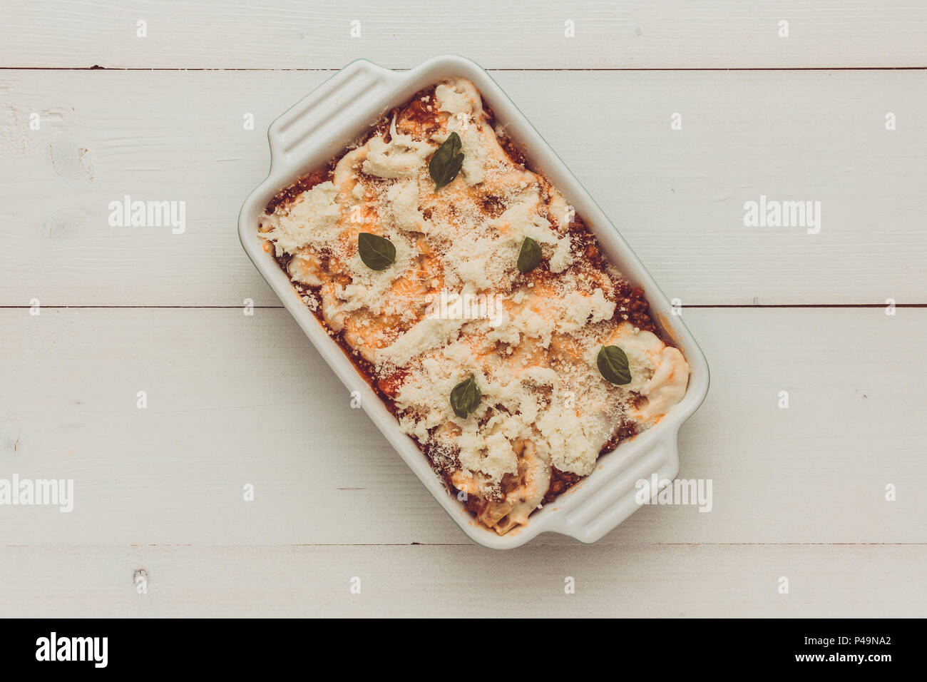 Lasagna Bolognese with Beef, Bolognese Sauce and Basil Ready for Baking Stock Photo