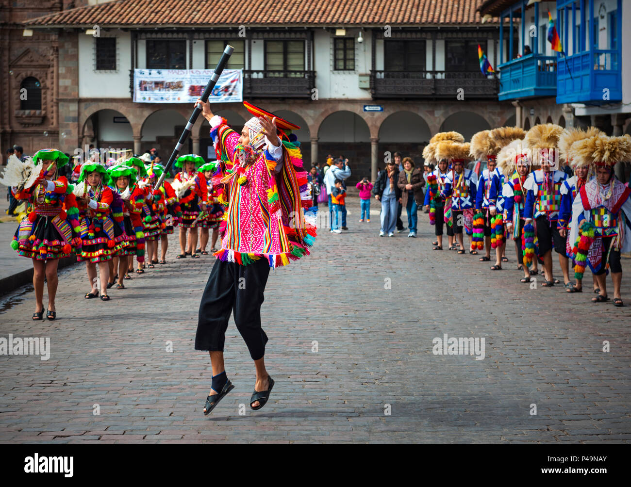 Young Quechua male dancer performing during the Inti Raymi Sun festival in traditional clothing and hat on the Plaza de Armas of Cusco, Peru. Stock Photo