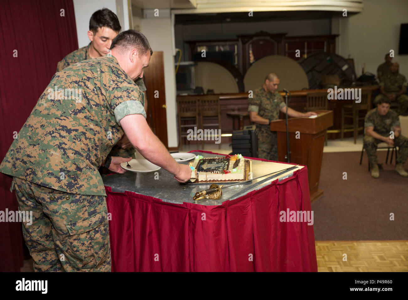 senior chief hospital corpsman mitchell woods cuts the birthday cake during the 118th navy hospital corpsman birthday ceremony aboard morn air base spain june 17 2016 marines and sailors with special purpose marine air ground task force crisis response africa came together to celebrate and reflect on the heritage and history of the us navy hospital corps us marine corps photo by staff sgt tia naglereleased P49R60