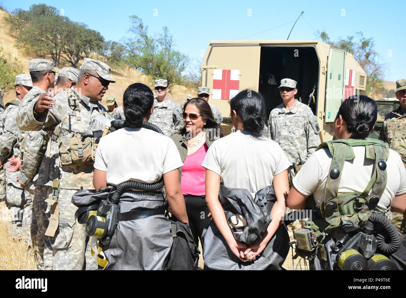 The Honorable Debra S. Wada, Assistant Secretary of the Army (Manpower & Reserve Affairs) visit Soldiers of the 29th Infantry Brigade Combat Team during their Exportable Combat Training Capability exercise Jun 16 at Camp Roberts California. XCTC focuses on fully instrumental and realistic collective training to certify platoon & company level training proficiency in coordination with First Army. Commanders and leaders assess their Soldiers strengths and weaknesses during a video review session after training which aids in their proficiency as an individual, team, platoon, unit and brigade. (U. Stock Photo