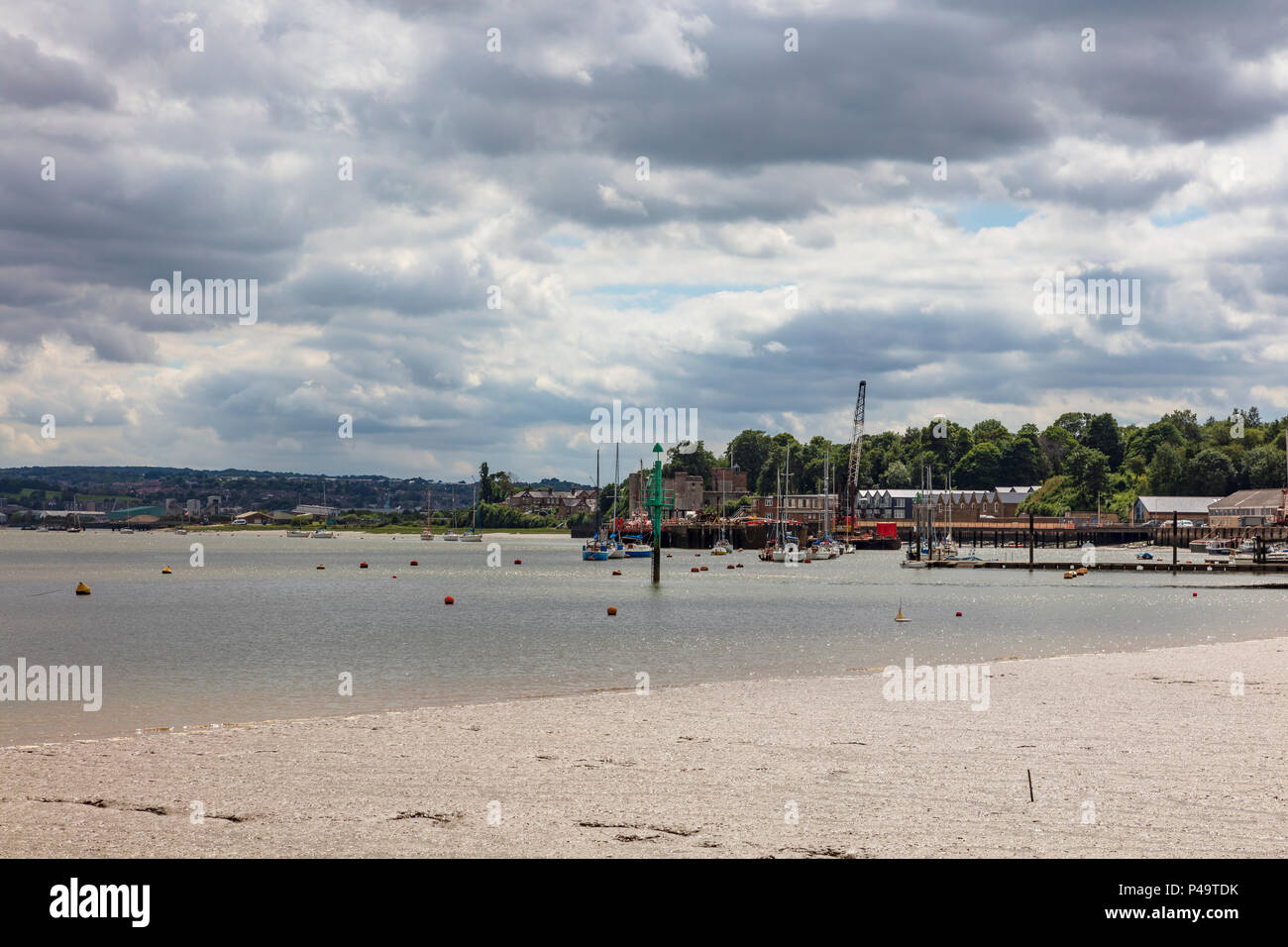 A view from Medway Yacht Club along the River Medway to Upnor Castle and Chatham in the distance, Upnor, Kent, UK Stock Photo