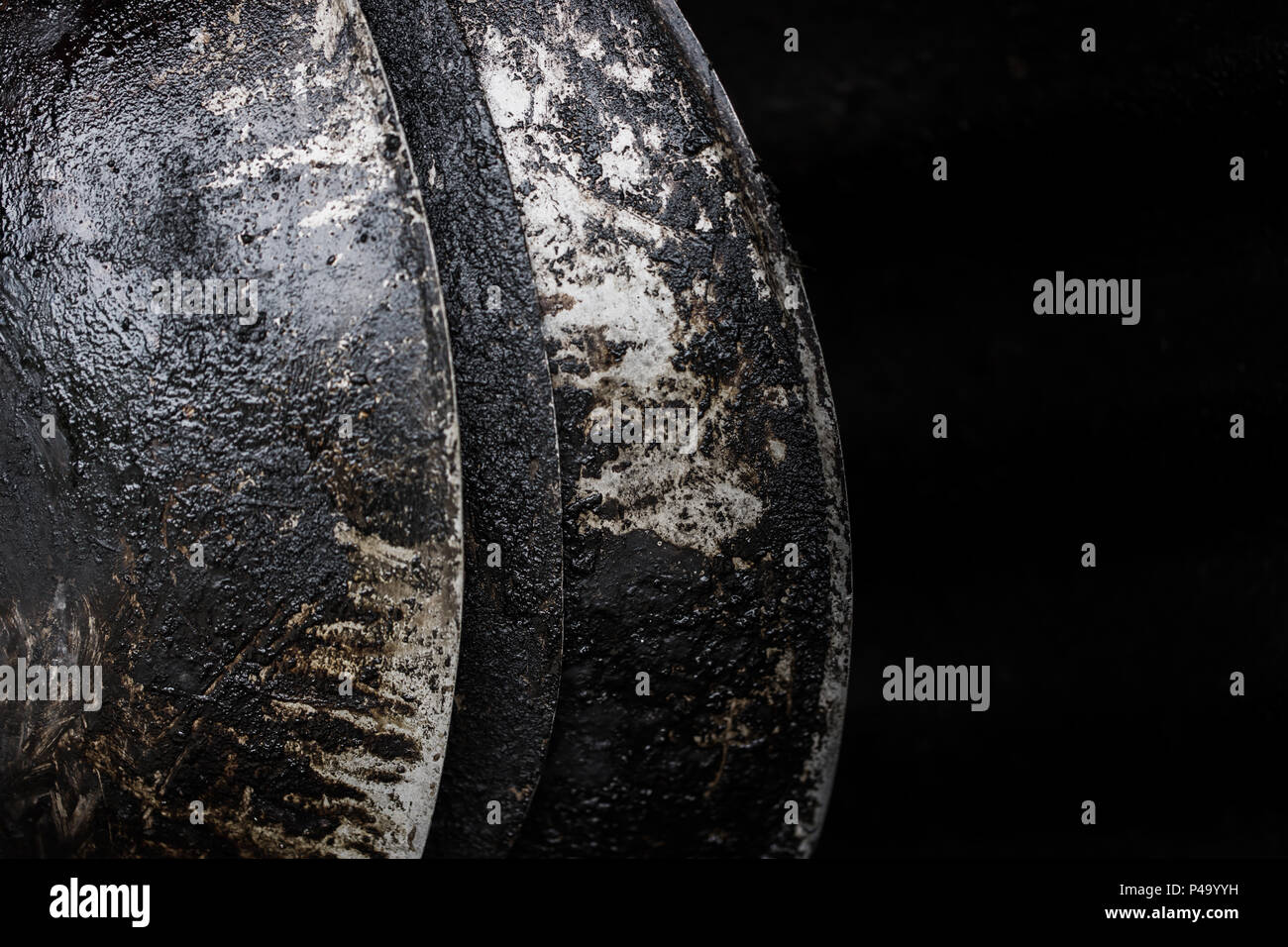 burn black pan. grunge grease dirty unhealthy food oil pan in the