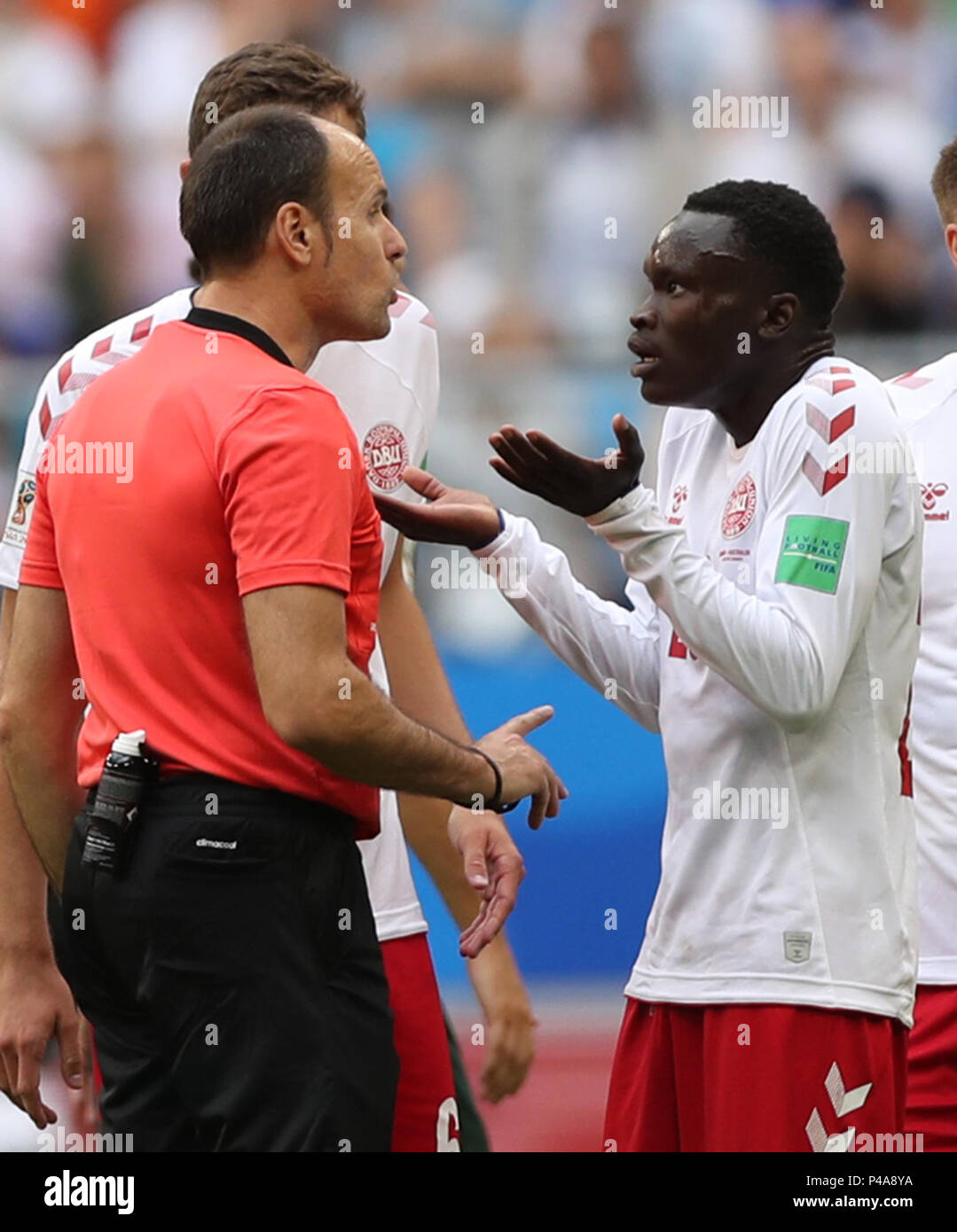 Samara, Russia. 21st June, 2018. Pione Sisto (R) of Denmark argues with the referee during the 2018 FIFA World Cup Group C match between Denmark and Australia in Samara, Russia, June 21, 2018. Credit: Fei Maohua/Xinhua/Alamy Live News Stock Photo