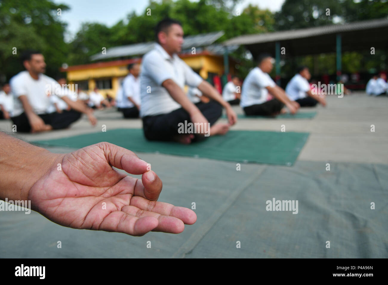 Members of the military force spreading their hands out while relaxing