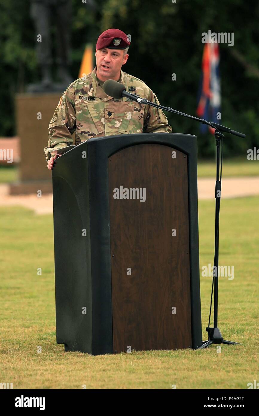 Lt. Col. Christopher Schilling, outgoing commander of 3rd Military Information Support Battalion, 4th Military Information Support Group, speaks to family, friends, leaders and the Soldiers of 3rd MISB during the battalion change of command ceremony on Fort Bragg, June 24. During the ceremony, Schilling relinquished command of the battalion to Lt. Col. Christopher Stangle. Stock Photo