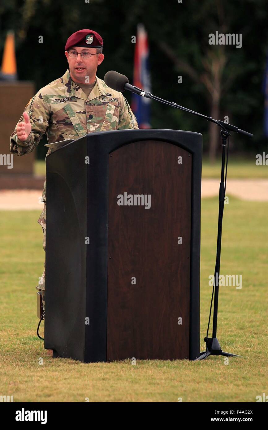 Lt. Col. Christopher Stangle, commander of 3rd Military Information Support Battalion, 4th Military Information Support Group, speaks to family, friends, leaders and the Soldiers of 3rd MISB during the battalion change of command ceremony on Fort Bragg, June 24. During the ceremony, Stangle assumed command of the battalion from Lt. Col. Christopher Schilling. Stock Photo