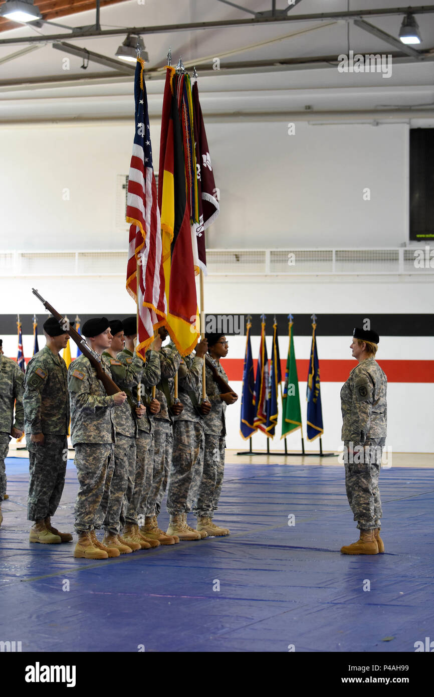 The color guard stands in formation in preparation of the honors to the ...