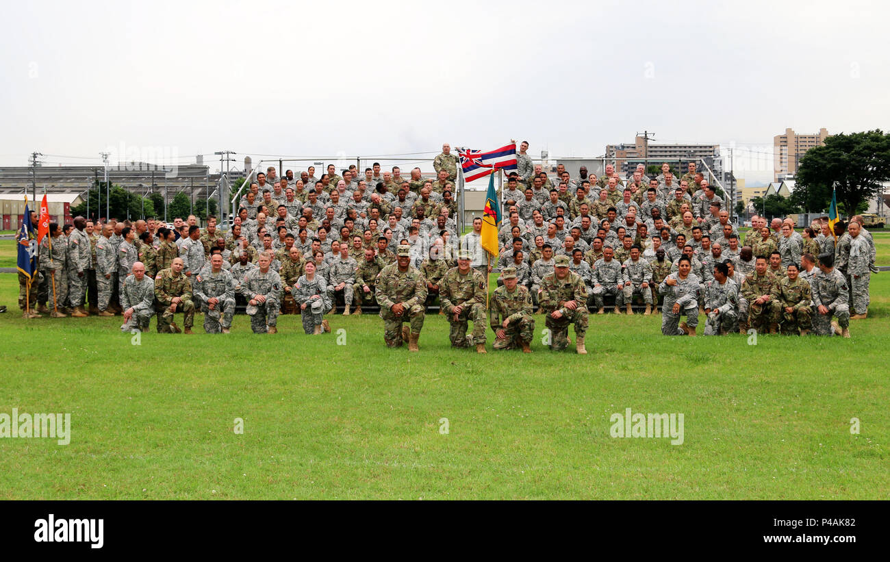 Pacific Reserve, guard Soldiers wrap up Imua Dawn 2016 with a group photo, Sagamihara Depot, Kanagawa, Japan, June 25, 2016. Imua Dawn 2016 focused on maneuver support operations and enhancing cooperative capabilities in mobility, Humanitarian Assistance and Disaster Relief (HADAR), Noncombatant Evacuation Operations (NEO), and sustainment support in the event of natural disasters and other crises that threaten public safety and health in the Pacific region. Stock Photo