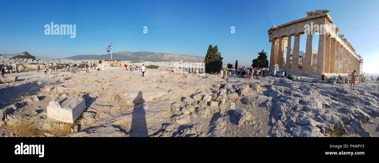 Athens, Greece - June 9, 2018: Panorama of tourists walking around the Parthenon at the Acropolis of Athens in Greece Stock Photo