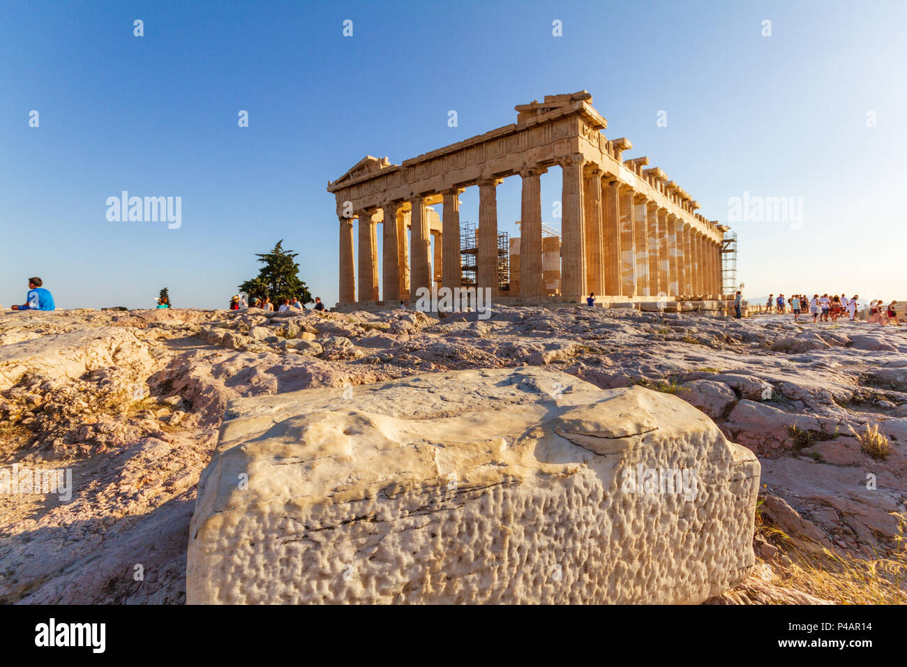 Athens, Greece - June 9, 2018: The Parthenon on the Acropolis of Athens surrounded by tourists on a summer afternoon Stock Photo