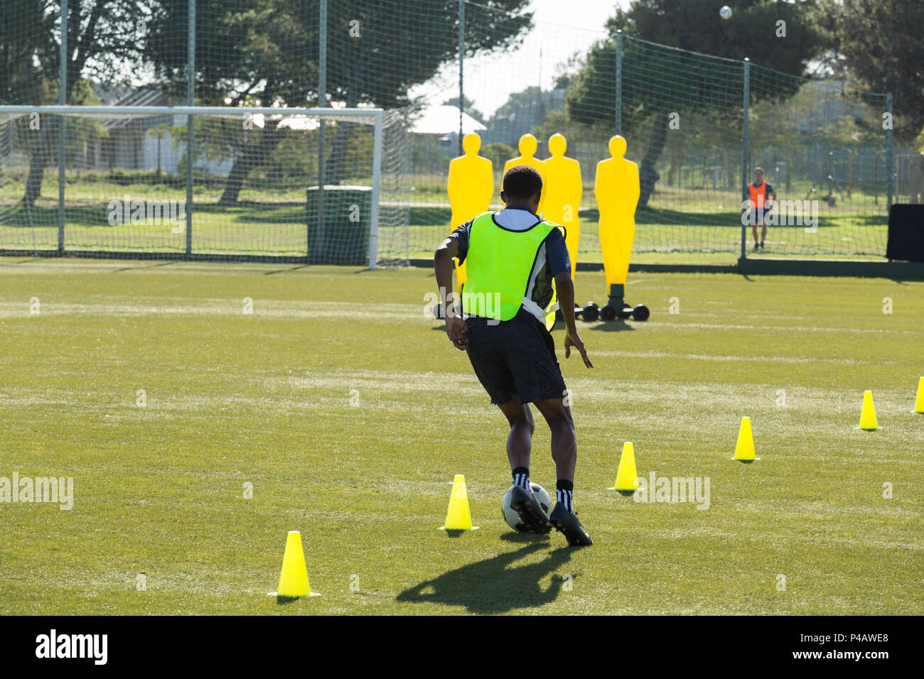 Soccer player dribbling ball hires stock photography and images Alamy
