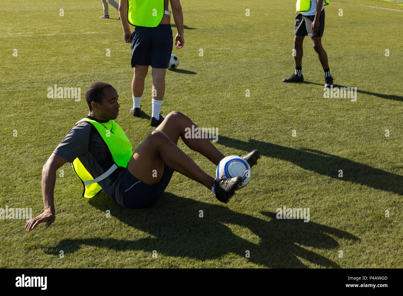 Soccer player practicing with a ball Stock Photo Alamy