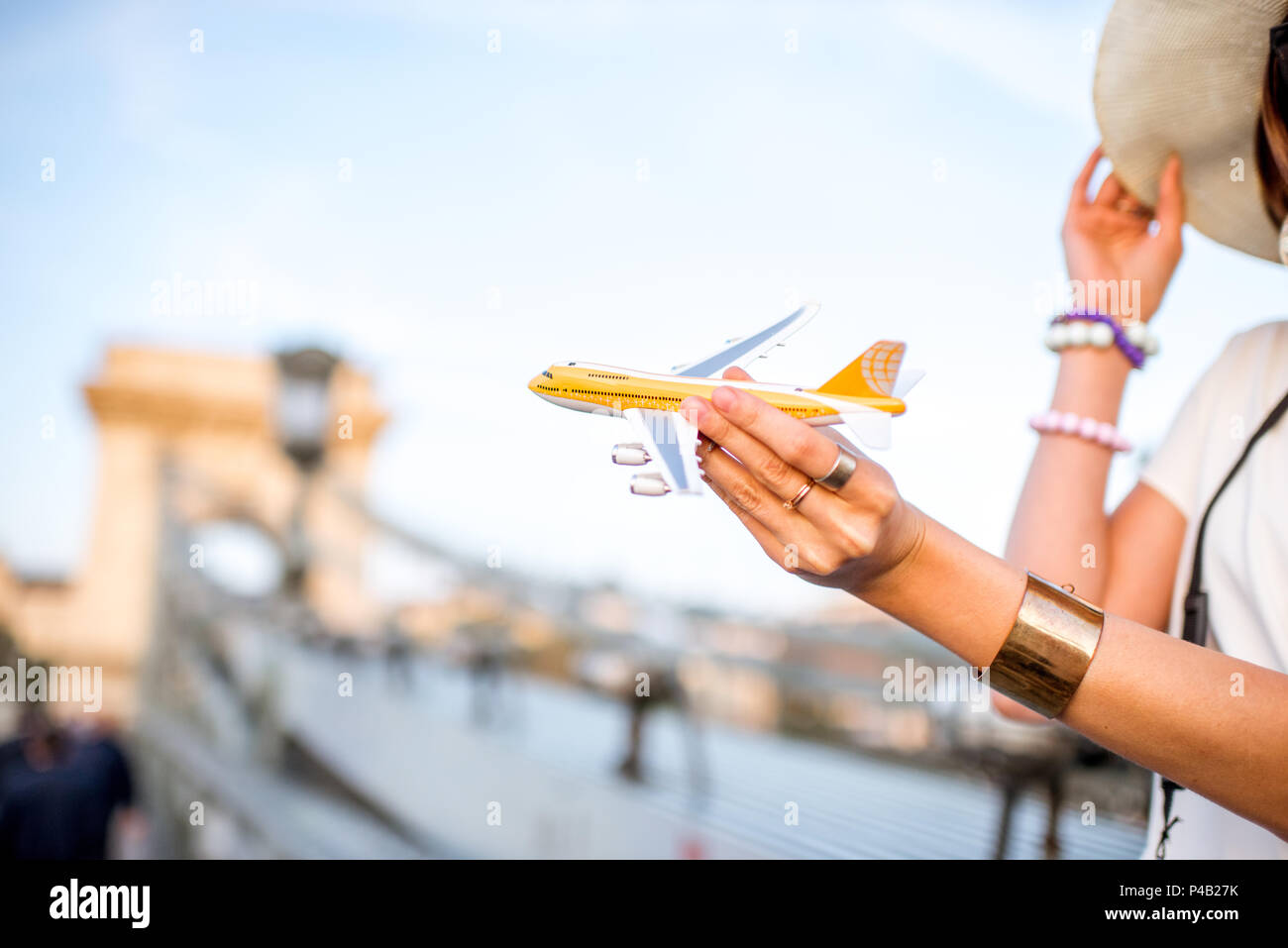 Flying with toy airplane in Budapest Stock Photo