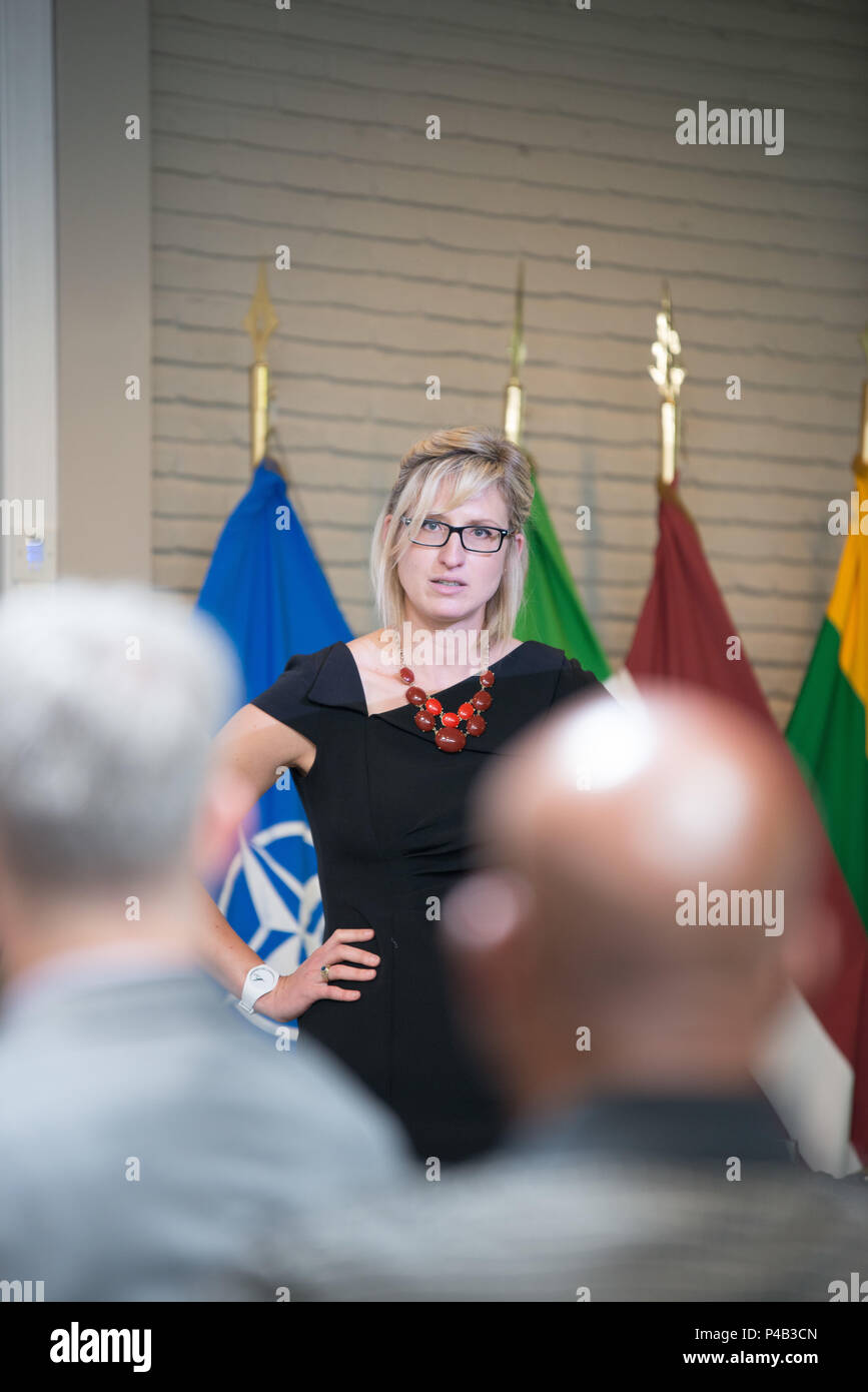 Eva Tukarski, a former U.S. Navy Officer, now head of the European Recruiting Office of a military placement firm gives a briefing during the Employment and Career Expo, at SHAPE, Belgium, June 17, 2016. (U.S. Army photo by Visual Information Specialist Pierre-Etienne Courtejoie/Released) Stock Photo