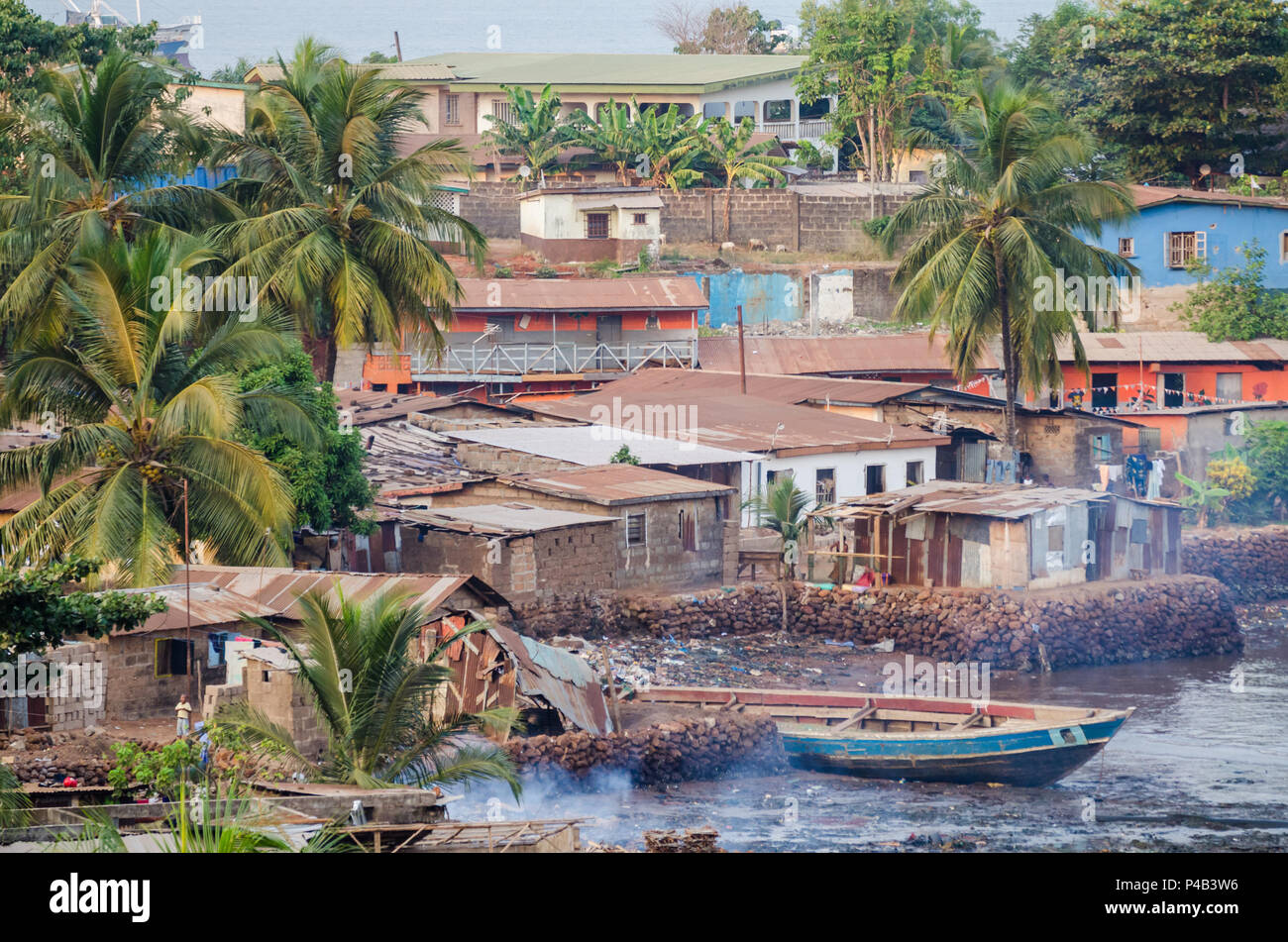 View over slums of Freetown at the sea where the poor inhabitants of this African capital city live, Sierra Leone, Africa. Stock Photo