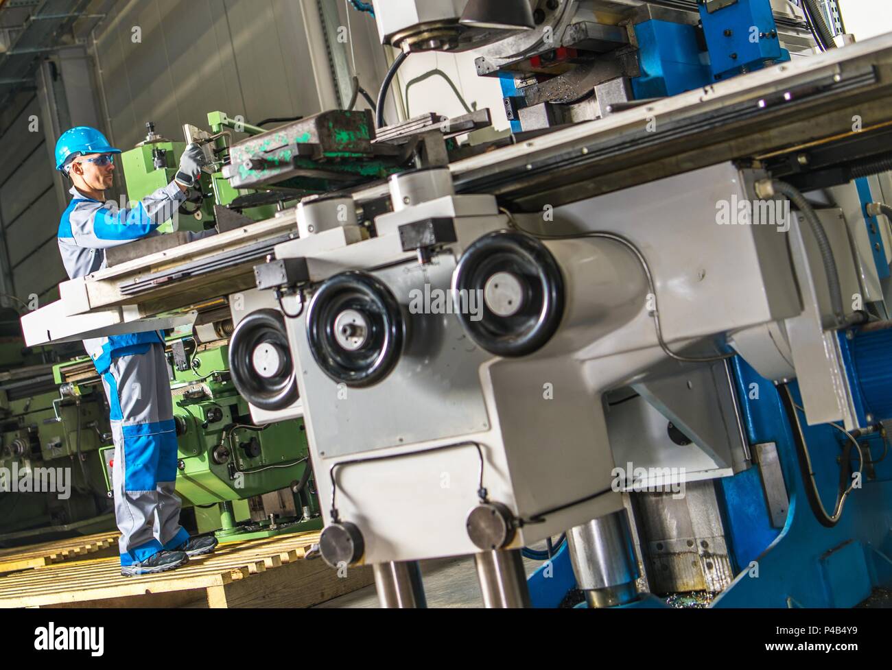 Heavy Duty Lathe Machinery Operator. Caucasian Metalworking Industry