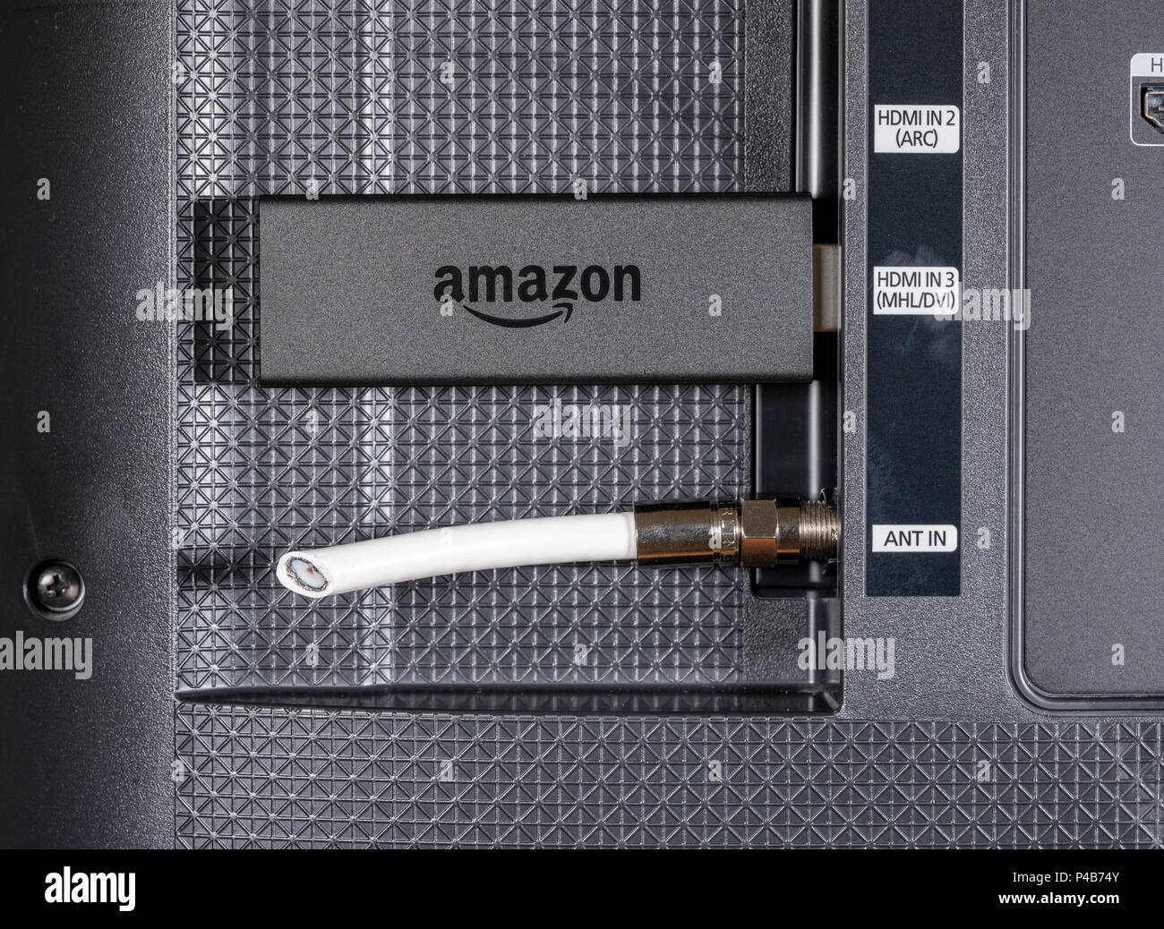 Amazon Fire TV streaming stick by cut antenna cord Stock Photo